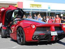 This gorgeous Ferrari LaFerrari made a huge impact at DC Exotics last Saturday in Sterling, Virginia. That beautiful color is known as Rosso Fuoco. Thanks to Ethan Malinowski.