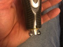 Here you can see the notorious split in the resin that oem carbon fiber gets on the lower segment. Cannot notice it when installed. 