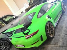 Green Porsche 911 GT3 RS in Doha, Qatar. 