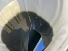 This is what I found when flushing the PS fluid on my 2010 Rapide. I wonder if it's the original fluid...