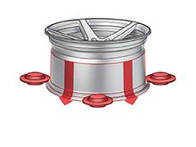 An initial casting unique to Flow Forging Technology is placed onto a steel rim and mold and prepped to be processed.