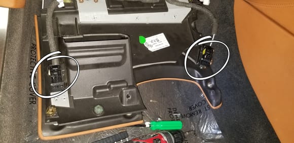 Does anyone know what are the two things i put in circles? Power goes to them and it looks like they "latch" to that panel but i don't see how to "open" them to latch /unlatch.
(Side note: It was a few things broke already that I see I'm going to have to hot glue/gorilla glue back together)
