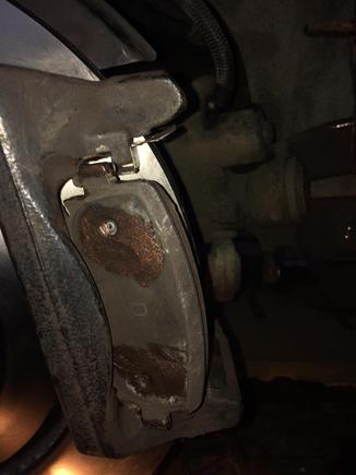 Fit the new disk , apply copper slip to the ears on the pads . gently rotate then in .This is after cleaning up the sliders .Theses were in good condition after a clean .