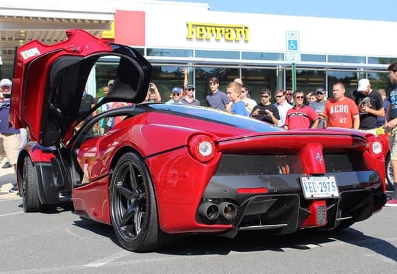 This gorgeous Ferrari LaFerrari made a huge impact at DC Exotics last Saturday in Sterling, Virginia. That beautiful color is known as Rosso Fuoco. Thanks to Ethan Malinowski.