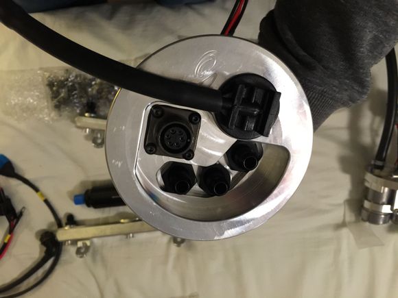 Top plate with vent showing the MILspec wiring connector.