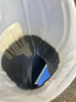 This is what I found when flushing the PS fluid on my 2010 Rapide. I wonder if it's the original fluid...