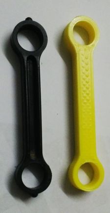3d printed link (yellow) , 5mm longer than standard (black)