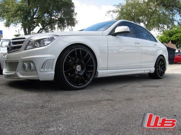 Wald Body Kit. 20&quot; HRE M40 wheels in Gloss Black finish with white pinstripe