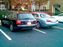 The Audi and Jaguar from the rear.