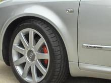 Painted brake calipers (not finished) &amp; "ULTRASPORT" decals on door mouldings.