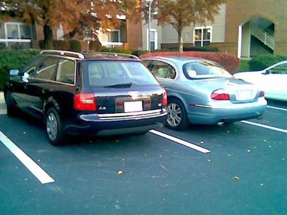 The Audi and Jaguar from the rear.