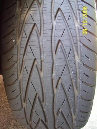 Slightly worn &quot;Sipped&quot; Toyo Proxes 4 
Sipping is where more tread is created by cutting the tire, as you can see. Proven to both stop quicker and hold higher G's in cornering. See your Les Schawb dealer for details.