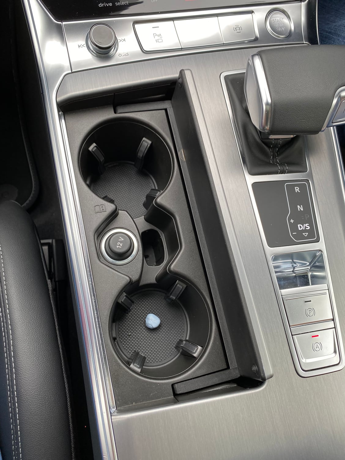 Cup holder cover stuck in open position -  Forums