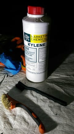 Xylene only use with proper respirator protection mask is great for dissolving rubbery stuff like old RTV silicone seals.