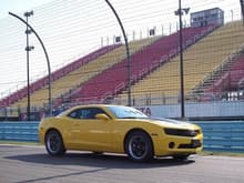 My 2010 Camaro in front of the front-stretch grandstands.