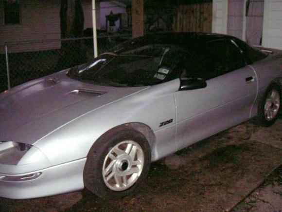 95 camaro in front yard with orb at bottom of car by door  8 7 10 2