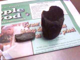 Pieces of Catalytic converter before I removed it ...