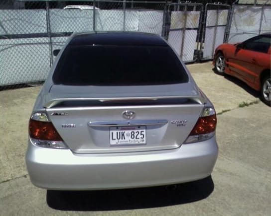 My camry rear shot. 05 camry SE tail lights, black roof panoramic glass style.