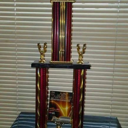 Got this trophy at Nopi also 1st place for a system that I did for a friend of mine Black Nissan Maxima two Kicker 12s CVR Memphis three way components TMA 1000.1 TMA 600.4 CUSTOM fiberglass enclosure spare tire well amp rack plexiglass see through..good times
