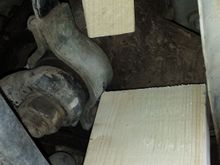 Side support for steering box