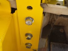 You can see the passenger side support bracket mounted over the gas tank skid.