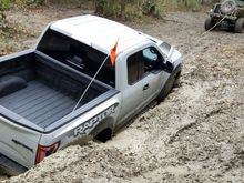 2017 Ford Raptor with 12k miles stuck on the frame in a nasty whole  (which me and Brandon proceeded to dominate to show them who's boss)