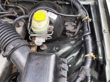 The washer hose was added back ontop of the harness (I may relocate this) and it was routed the same as the harness 