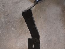 I bent the mounting tabs to conform to the fender