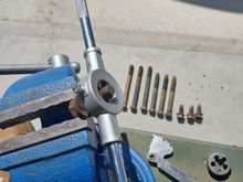 I ultrasonic cleaned all the bolts in white vinegear since it's cheaper than a gallon of WD-40 or evaporrust. I then took them out and chased all of the threads. I am probably going to replace these, but I think I am going to use them to moc the whole thing up first before I buy more hardware.