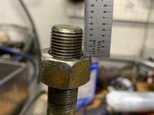 Next reinstall the extra nut to the length that you want to cut off the extra bolt length. I go about a 1/4” away from the hole.