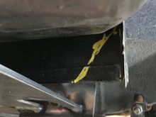 I cut this out and folded the inner fender back.