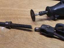 Cutting adjuster rod with Demel cut off wheel