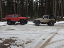 My XJ and my Grandfathers TJ (2 inch  lift, 33" mudclaws) 2/5/2015