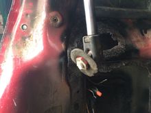 Broken hatch lift strut mounting stud.