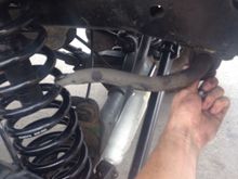 Passenger side rubs spring. Not sure if it's because it's from a zj