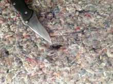 About 8 inches above the latch