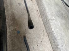 If you zoom you can see that one side of the tubing is worn so flat that it wore into the center. 