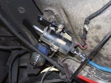 Mounted the fuel pump and filter in an "outta the way " location on the drive side in front of the rear end.