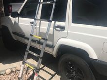Roofnest ladder hooked into aluminum bar, instead of the nest.  It's more secure and lockable.