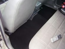 Jeep came with no carpets, so I bought a roll of carpet and cut them the way I wanted them. :)