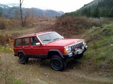 Check out those boggers baby. Uniroyal Liberators!! hahaha Took those off of my Jimmy, not realizing they were 225's instead of 235's. oh well. They work for now