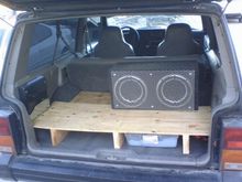 rear 'false floor' to store all of my tools and camping gear with out giving up much cargo space