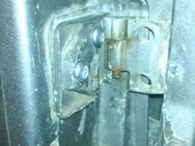 Upper hinge after cutting, aligning and re-installation.
