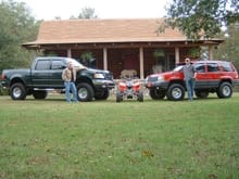 best friend and our trucks... my fully built 450r... my dog in the background... and my house i grew up in... damn i miss these days...