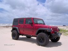 3'' rough country lift
15'' wheels
33'' tires
smitty built bumper
8000''lb wench
graphics