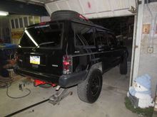 Jacking her up to plug a tire