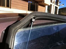 Almost pushed the glass completely out onto the ground.