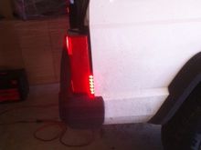 Euro-spec taillights legal now with an LED strip hard wired to existing running lights