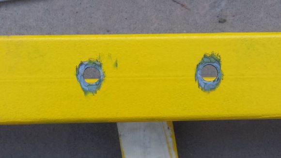 Take a grinder to the slider to clean off for the welding.