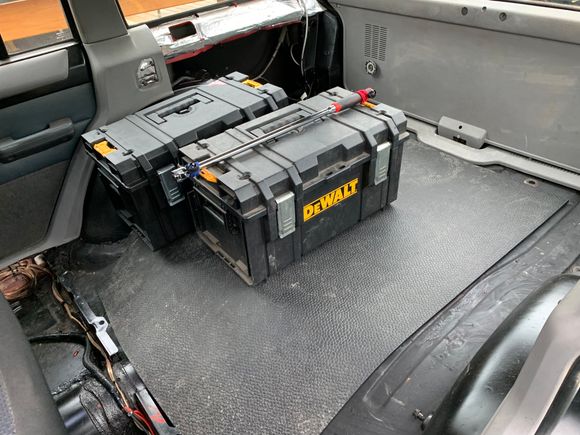I had a large storage system in the back and i decided to remove it along with the rear seats.